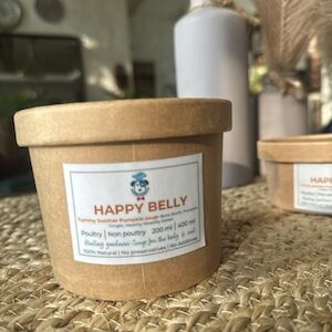 This image is of a brown paper tub with A bone broth based soup for dogs with pumpkin and healing spices.